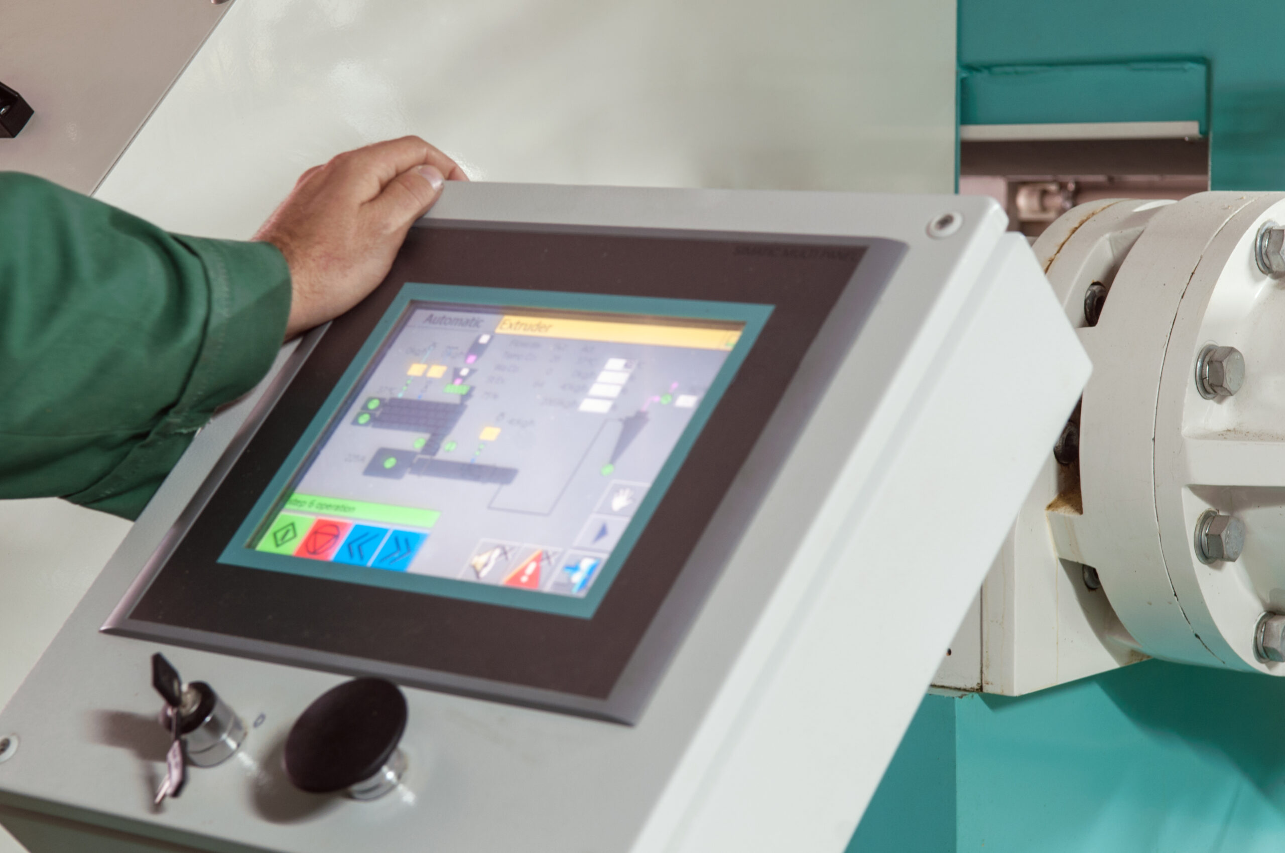 pressing important technology button at control panel in plant